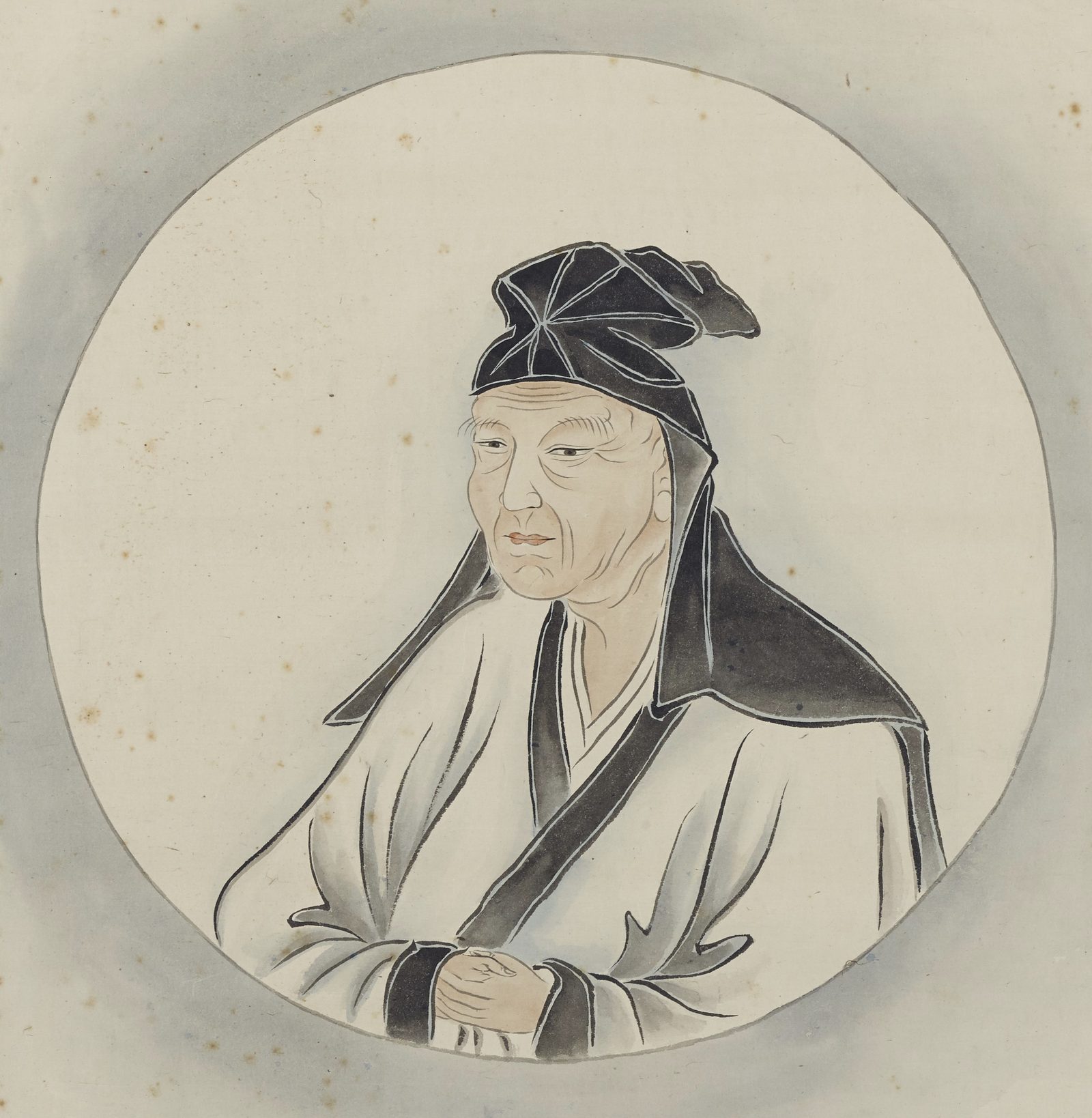 Roundel portrait of an elderly man in a white robe with a dark collar and a soft black cap with a hanging flap, his hands folded in front of him