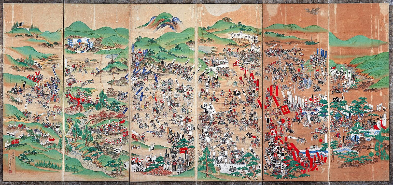 関ヶ原合戦図屏風。谷あいで激突する両軍