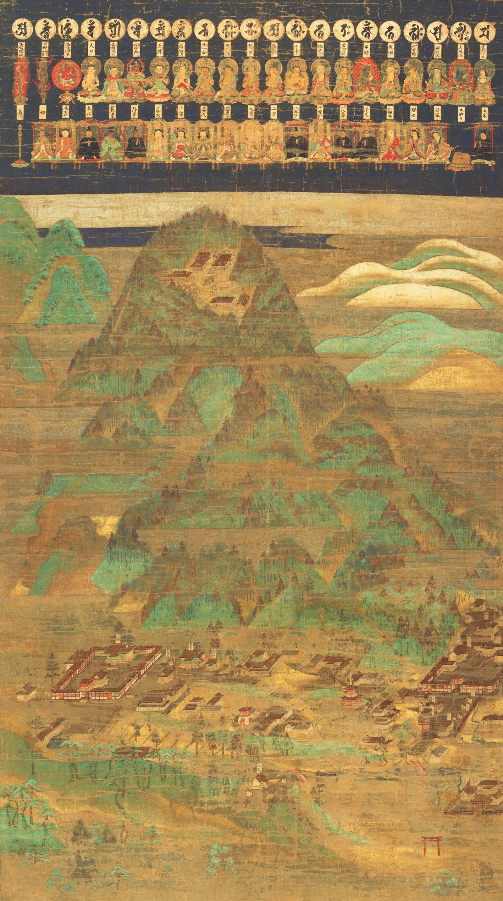 Hanging-scroll mandala: three rows of seed syllables, seated Buddhas and kami above a green mountain, with shrine halls and a red torii at its foot