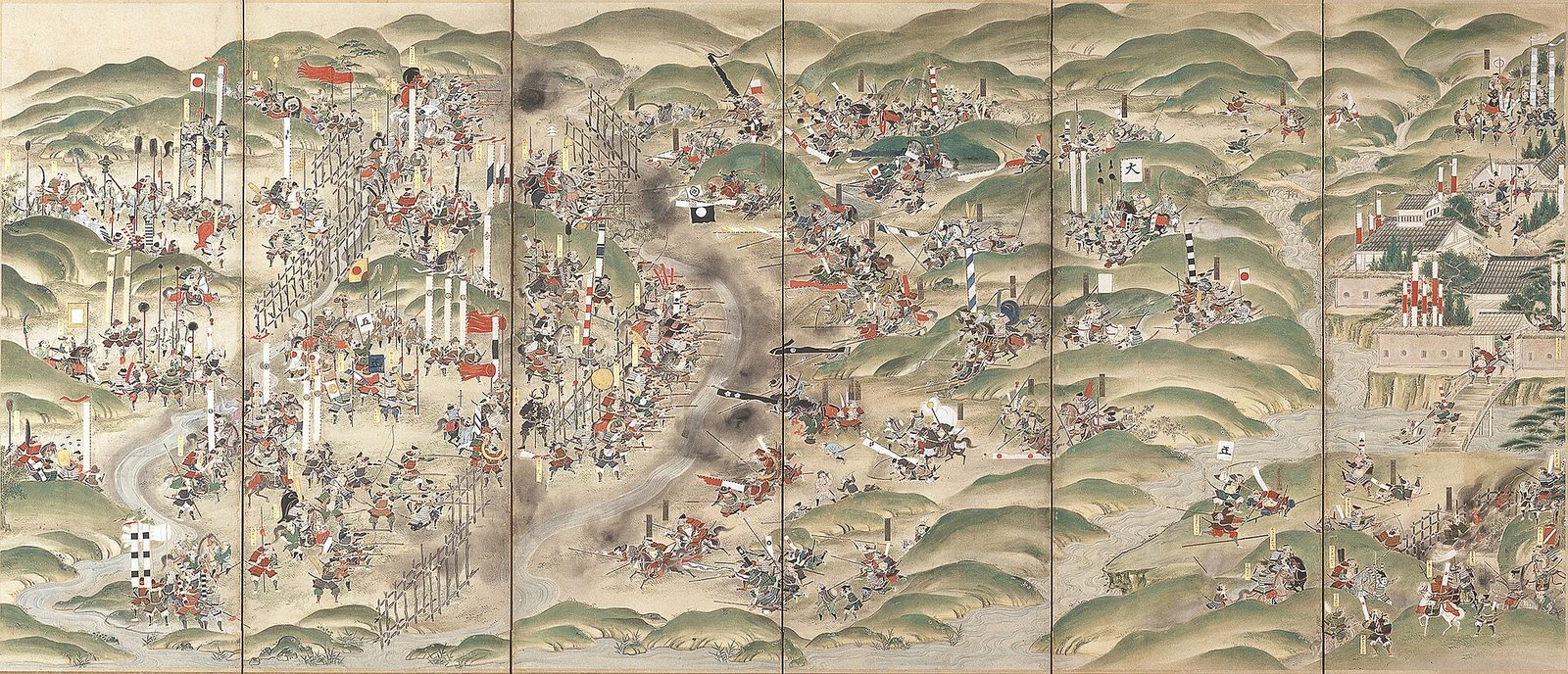 長篠合戦図屏風。馬防柵の内に並ぶ信長の鉄砲隊