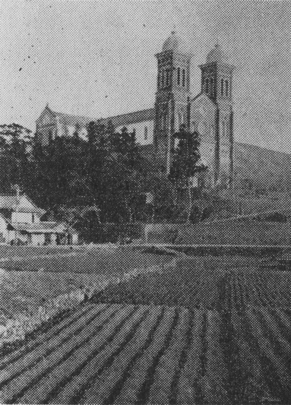 The completed red-brick Urakami Cathedral with its twin towers, in a photograph taken between 1925 and 1945.
